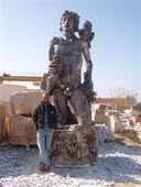 Irakli Chkhartishvili  is a young ,very hard working man from Georgia (Eastern Europe!). His 4.34 m statue made of grey marble showing :  HELIOS ... the ancient greek god of the sun